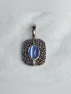 Premier Designs silver and blue cats eye pendant